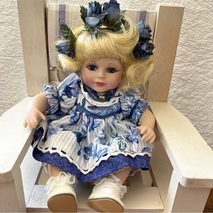 Marie Osmond porcelain tiny tot doll dressed in blue. Doll only